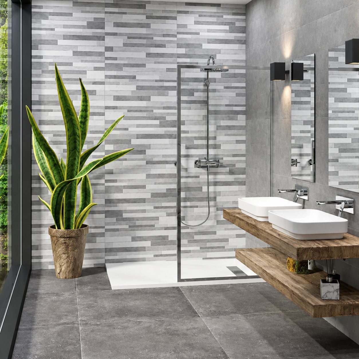 Salle de bain moderne aux murs de carrelage gris en bandes, avec une douche à l'italienne, deux vasques blanches sur une étagère en bois et une plante verte en pot.
